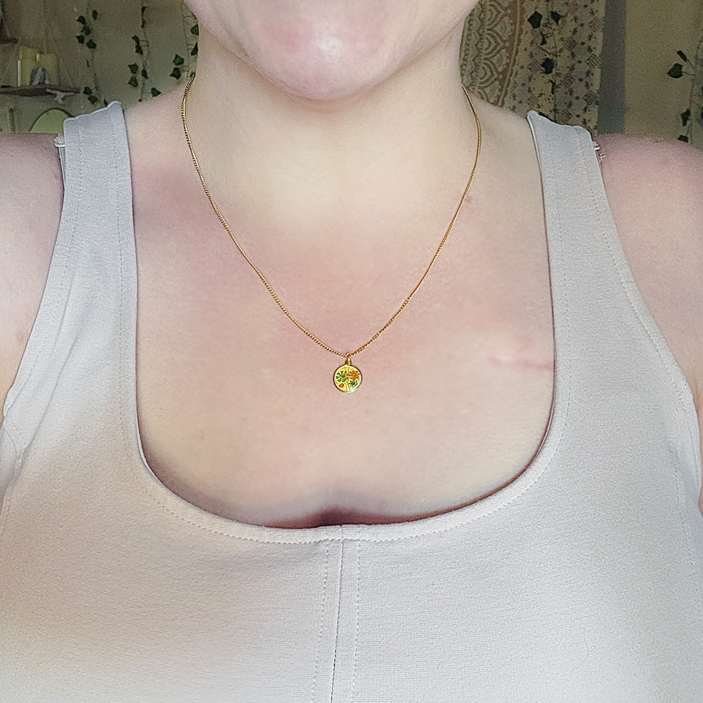 dainty gold cloisonne coin necklace worn on neck floral pendant everyday jewelry