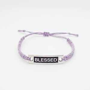 Handmade lilachemp bracelet with silver “Blessed” charm on white background, adjustable faith-inspired jewelry