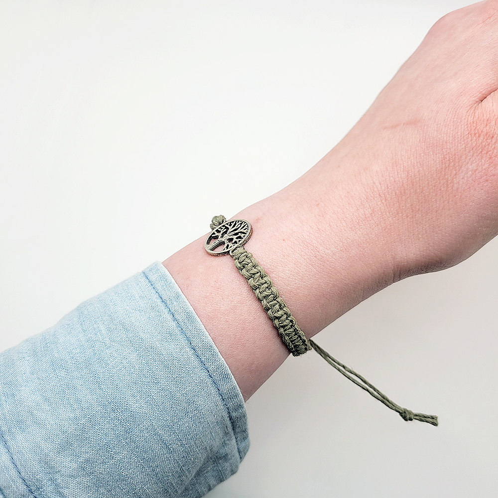 side view of adjustable hemp bracelet with sliding knot closure tree of life charm