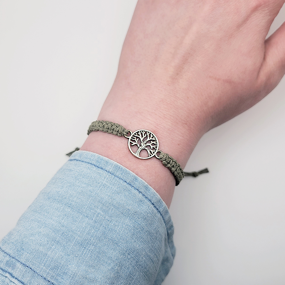 tree of life hemp bracelet worn on wrist adjustable cord bracelet with silver charm