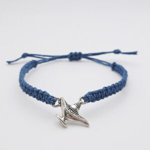 Blue handmade hemp bracelet with a silver lamp charm centerpiece, inspired by Psalm 119:105, featuring an adjustable sliding knot closure and minimalist faith-inspired design.